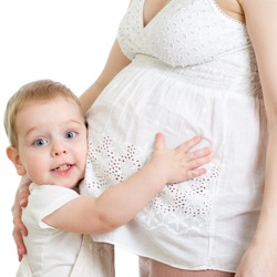 Pregnant Woman and Little Boy